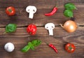 Lines of fresh vegetables and herbs on old wood Royalty Free Stock Photo