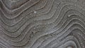Lines in wet grey sand Abstract Background