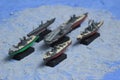 The lineup of miniature battleships consists of the enterprise carrier and others