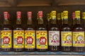 Lingayen, Pangasinan, Philippines - Bottles of locally made Patis or fish sauce for sale at a sidewalk stall