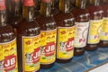 Lingayen, Pangasinan, Philippines - Bottles of locally made Patis or fish sauce for sale at a sidewalk stall