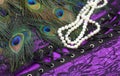 Lingerie and Pearls Background Purple and Black Lace With Feathers Royalty Free Stock Photo