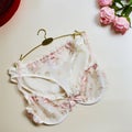 Lingerie set isolated on a beige background Royalty Free Stock Photo