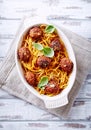 Linguine baked with meatballs, tomato sauce and parmesan Royalty Free Stock Photo