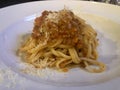 Linguine Bolognese with cheese . White