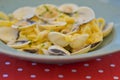 Linguine with clams. Traditional Italian pasta with clams and other sea food. Healthy meal. Eating out in restaurant Royalty Free Stock Photo