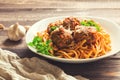 Linguine pasta with meatballs in tomato sauce and parsley Royalty Free Stock Photo