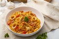 Linguine pasta with squid and cherry tomato in tomato sauce