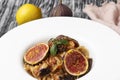Linguine (spaghetti) with bottarga and figs. Royalty Free Stock Photo