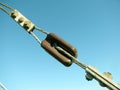 Link of the cable pulled against blue sky. Royalty Free Stock Photo