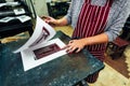 Linocut. manual printing on the machine