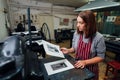 Linocut. manual printing on the machine