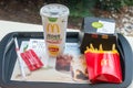 Mcdonald`s with Signature Salsa Avocado sandwich, french fries and cup with Coca-Cola for drink