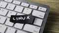 Linux Operating System Concept with Hand-Written Note on Computer Keyboard Representing Open Source Technology and Programming Royalty Free Stock Photo