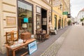 Antique shop with vintage furniture and other old things displayed outside on Bischofstrasse street in the center of Linz, Austria