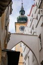 Linz, Austria, 27 August 2021: Medieval catholic Baroque Stadtpfarrkirche, clock bell tower, Parish Church at Pfarrplats, old town Royalty Free Stock Photo