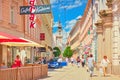 Linz, Austria: View of the Herrenstrasse street with walking people. The old town with colorful historical buildings Royalty Free Stock Photo