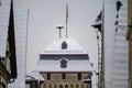 LINZ AM RHEIN, GERMANY - DEC 14, 2022: Top of Neutor tower in snow with siren