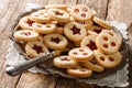 Linzer cookies with jam on a plate. Traditional Austrian biscuits filled. horizontal