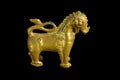 Lion ancient statue - Golden lion statue in Thai style with isolated on black background. Royalty Free Stock Photo