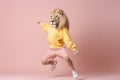 a lion dressed in sportswear being active, created with Generative AI technology