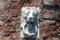 Lion emblem on the old red brick fortress in Livorno,Italy