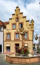 The lion fountain stands on the picturesque fish market in the heart of Offenburg in the background the historic building 1698 Royalty Free Stock Photo