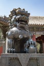 Lion in front of Summer Palace, Beijing, China. Lion with front paw on ball.