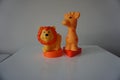 Lion and giraffe toys figures Royalty Free Stock Photo