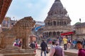 Lion guard, numerous visitors and an hinduist temple