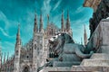 A Lion is guarding the Duomo di Milano Milan Cathedral in Italy. Milan Cathedral is the largest church in Italy and the third Royalty Free Stock Photo