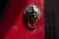 Lion Head Door Knob Closeup With Red Chinese Style Wooden Door Royalty Free Stock Photo