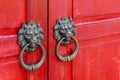 Lion Head Door Knob Closeup With Red Chinese Style Wooden Door Royalty Free Stock Photo