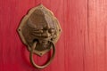 Lion Head Door Knob Closeup With Red Chinese Style Wooden Door Royalty Free Stock Photo