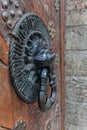 Lion Head Knocker, Ancient bronze handles on old oak door Royalty Free Stock Photo