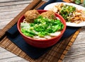 lion head noodle served in a bowl isolated on table top view of taiwanese food