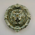 Lion head shaped brass door knocker Royalty Free Stock Photo