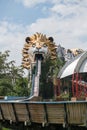 Lion head on top building of log flume at Siam park city, bangkok