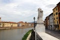 Lion holding a cartouche, stone carved sculpture at the embankment of Arno river, Pisa, Italy