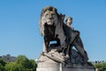 Lion a l'Enfant statue on Pont Alexandre III NW in Paris, France