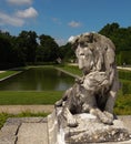 Lion and lionnes in garden of Vaux-le-Vicomte, France Royalty Free Stock Photo