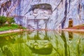 Lion of Lucerne and its reflections in waters of memorial pond, Lucerne, Switzerland Royalty Free Stock Photo