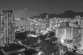 Lion Rock Hill and high rise residential building in Hong Kong city at night Royalty Free Stock Photo