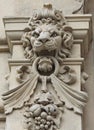 Lion`s head decoration on the facade
