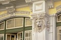 Lion`s head sculpture, detail of an art deco building in Lisbon