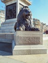 The LionÃ¢â¬â¢s statue at the base of the Nelson`s Column, monument in Trafalgar Square, City of WestMinster. Royalty Free Stock Photo