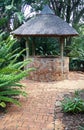 LION`S WISHING WELL FEATURE IN PRETORIA BOTANICAL GARDENS, SOUTH AFRICA