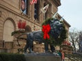 Lion sculpture against Chicago Michigan Avenue Art Institute in winter