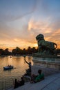 Lion sculpture in Buen Retiro park lake, Madrid Royalty Free Stock Photo