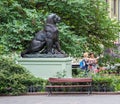 Lion sculpture, people taking photos